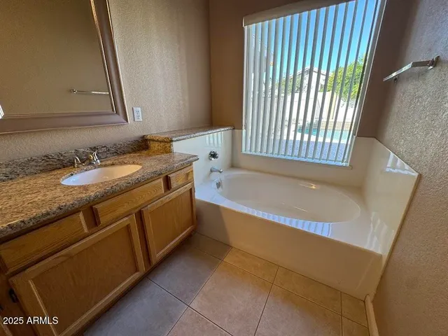 a white toilet sitting next to a shower