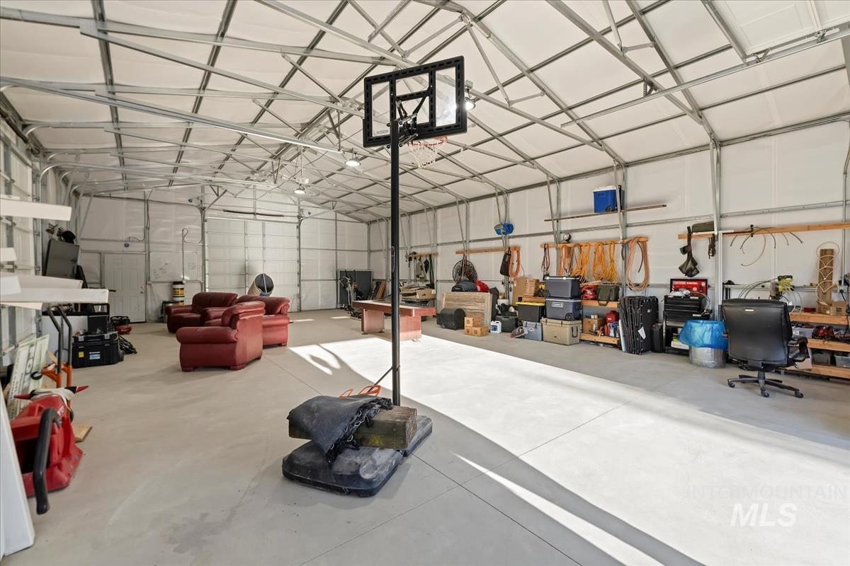 17571 Goodson Road Caldwell, ID 83607 - Photo 21 of 36 Garage featuring metal wall