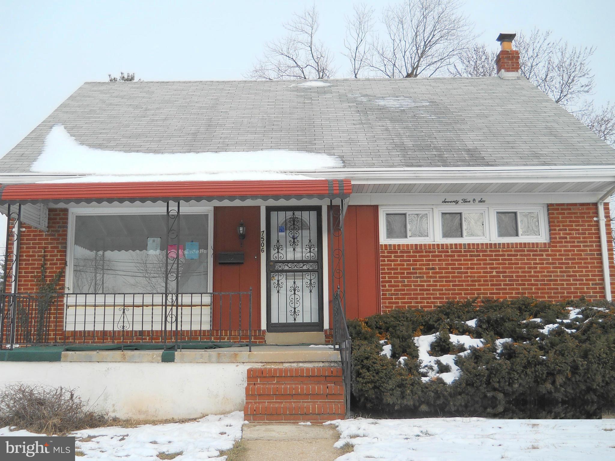 7506 Rockridge Road Baltimore, MD 21208 - Photo 1 of 12 a front view of a house