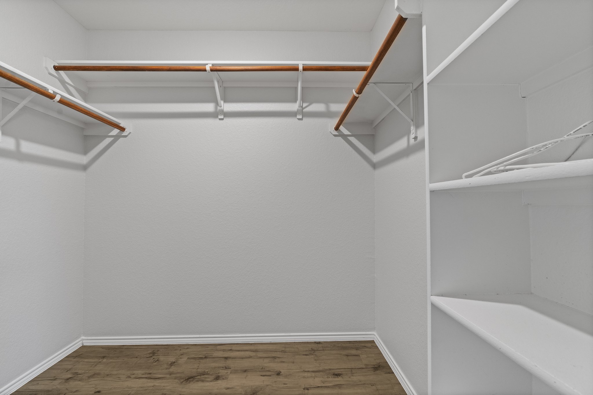 5800 Maciver Drive Austin, TX 78754 - Photo 18 of 27 Spacious closet with dark wood-style floors