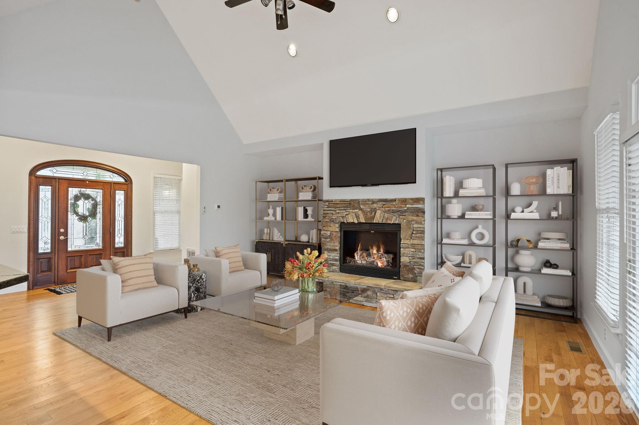 199 Judson Ridge Road Arden, NC 28704 - Photo 11 of 48 a living room with furniture fireplace and flat screen tv
