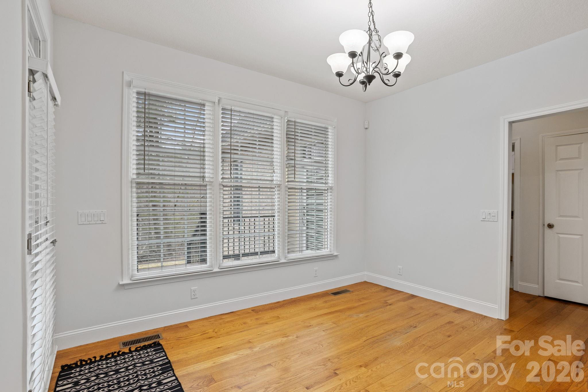 199 Judson Ridge Road Arden, NC 28704 - Photo 16 of 48 a view of an empty room with a window