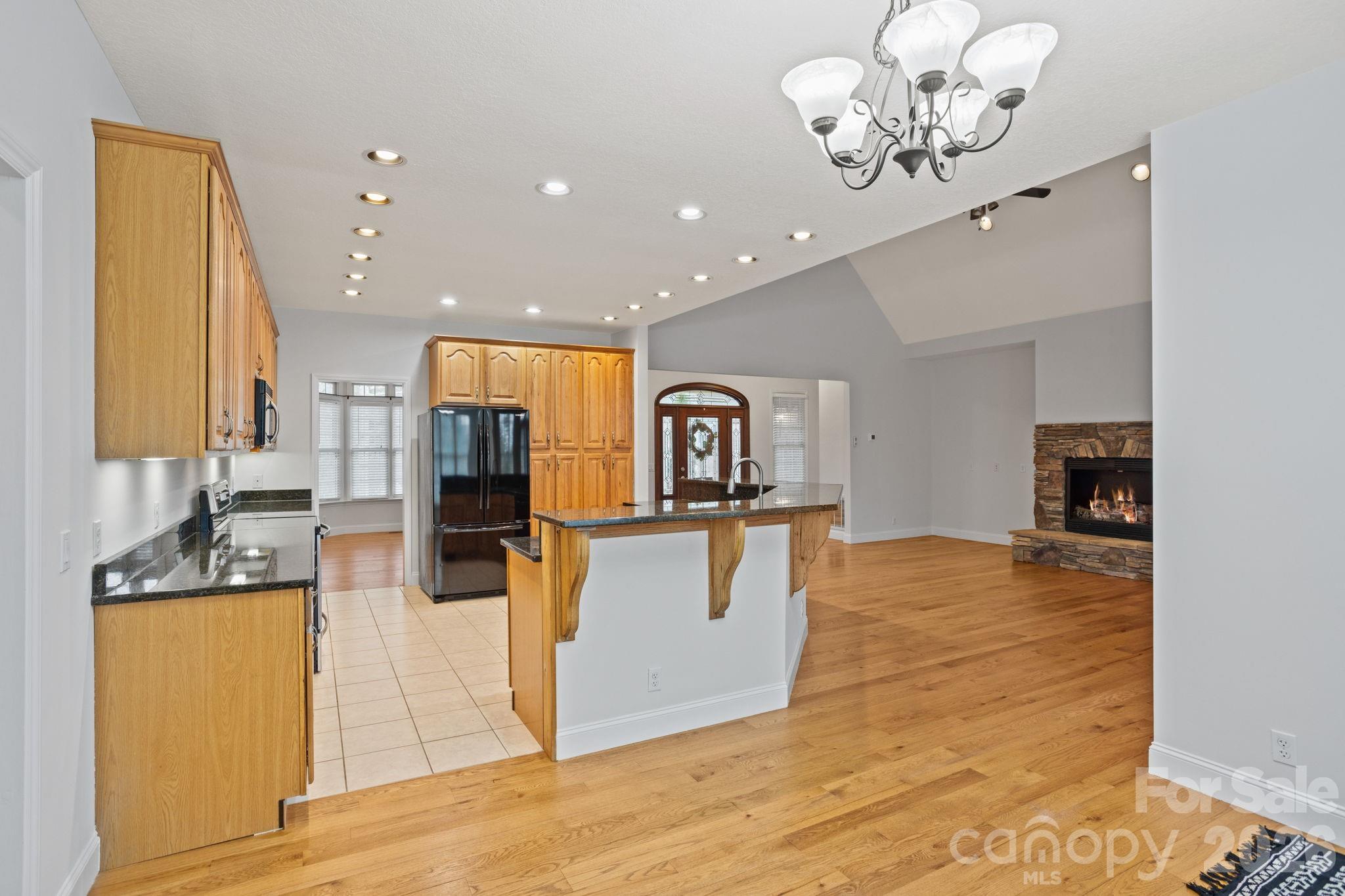 199 Judson Ridge Road Arden, NC 28704 - Photo 17 of 48 a view of a living room and kitchen