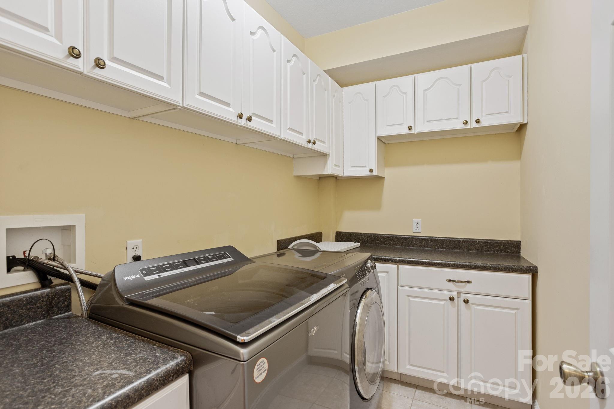 199 Judson Ridge Road Arden, NC 28704 - Photo 23 of 48 a room with storage and utility