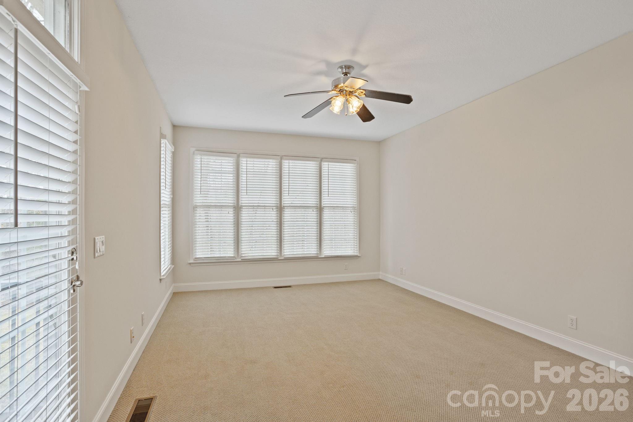 199 Judson Ridge Road Arden, NC 28704 - Photo 25 of 48 a view of an empty room with a window