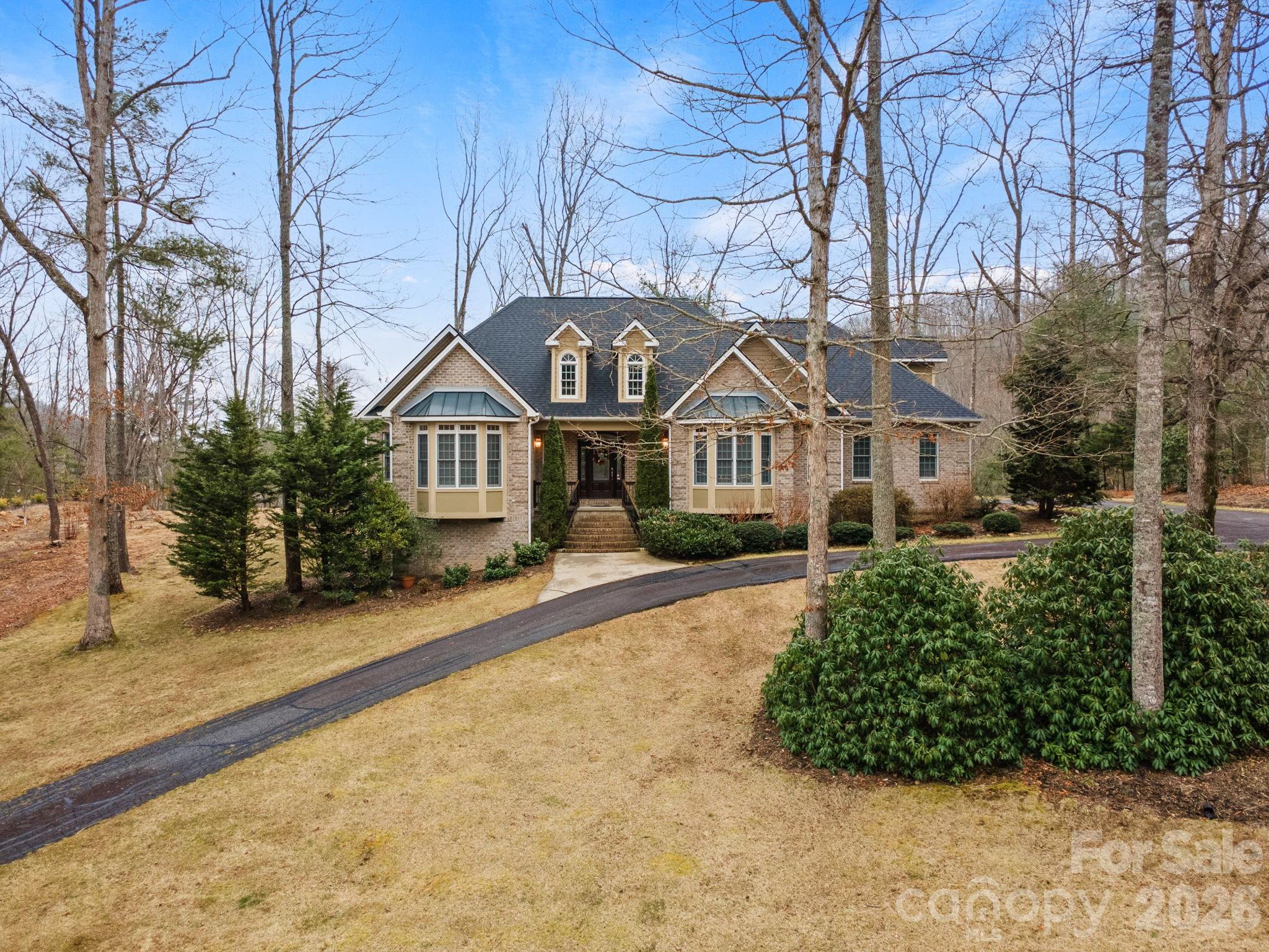 199 Judson Ridge Road Arden, NC 28704 - Photo 3 of 48 a front view of a house with a yard