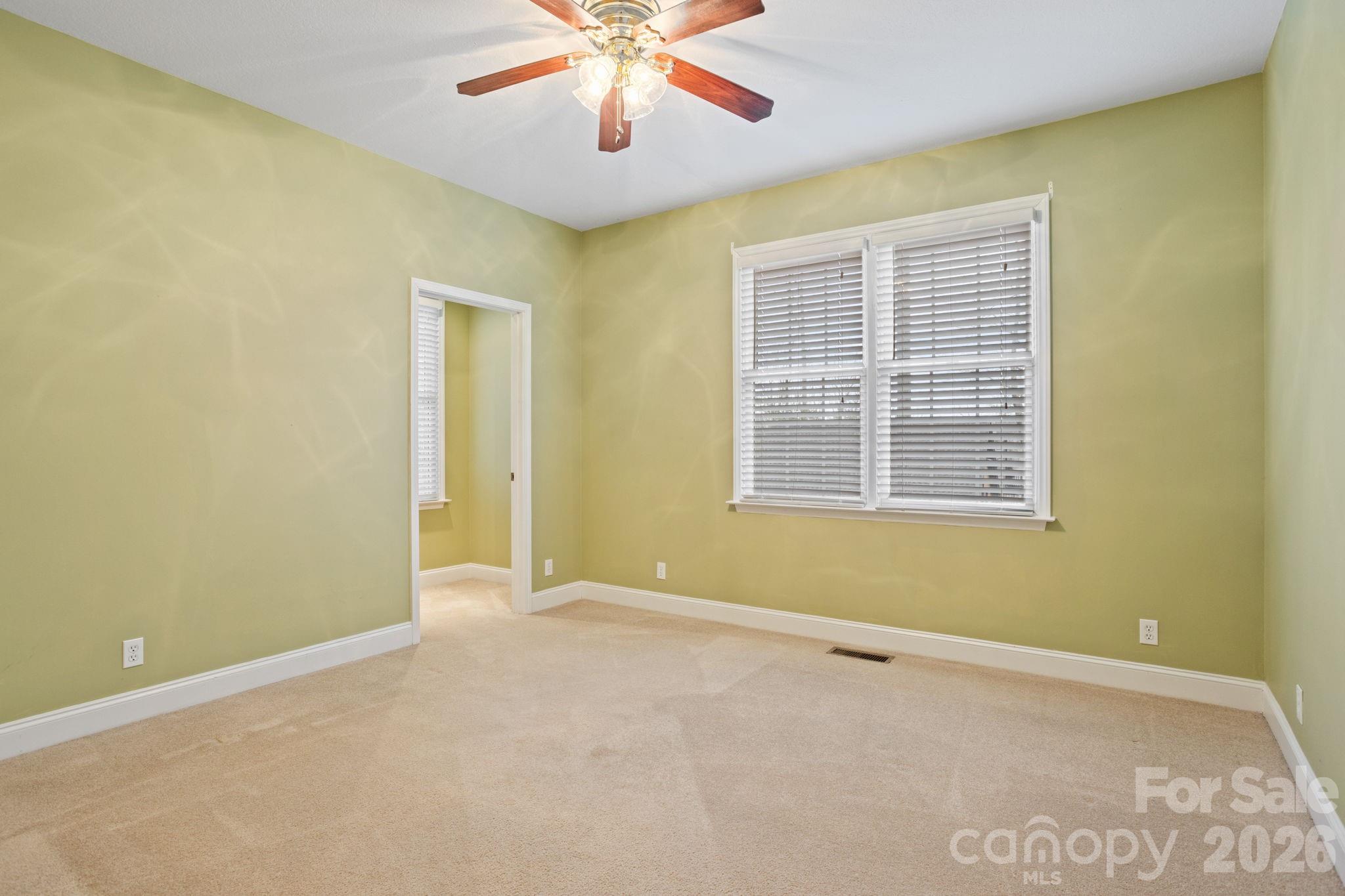 199 Judson Ridge Road Arden, NC 28704 - Photo 36 of 48 an empty room with a window