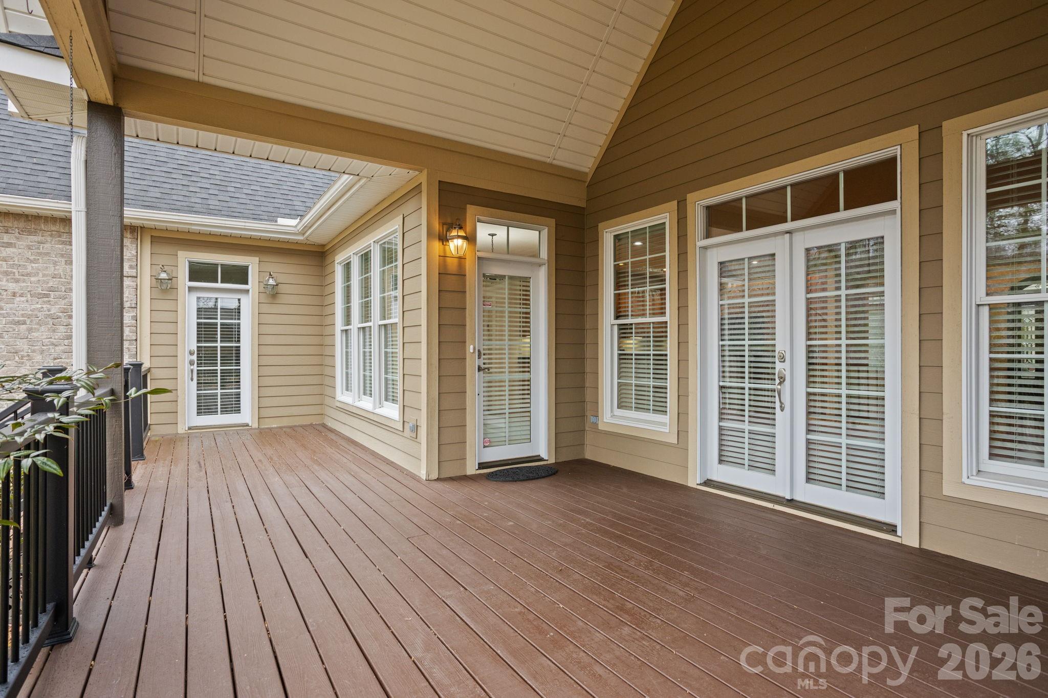 199 Judson Ridge Road Arden, NC 28704 - Photo 41 of 48 an empty room with wooden floor and windows