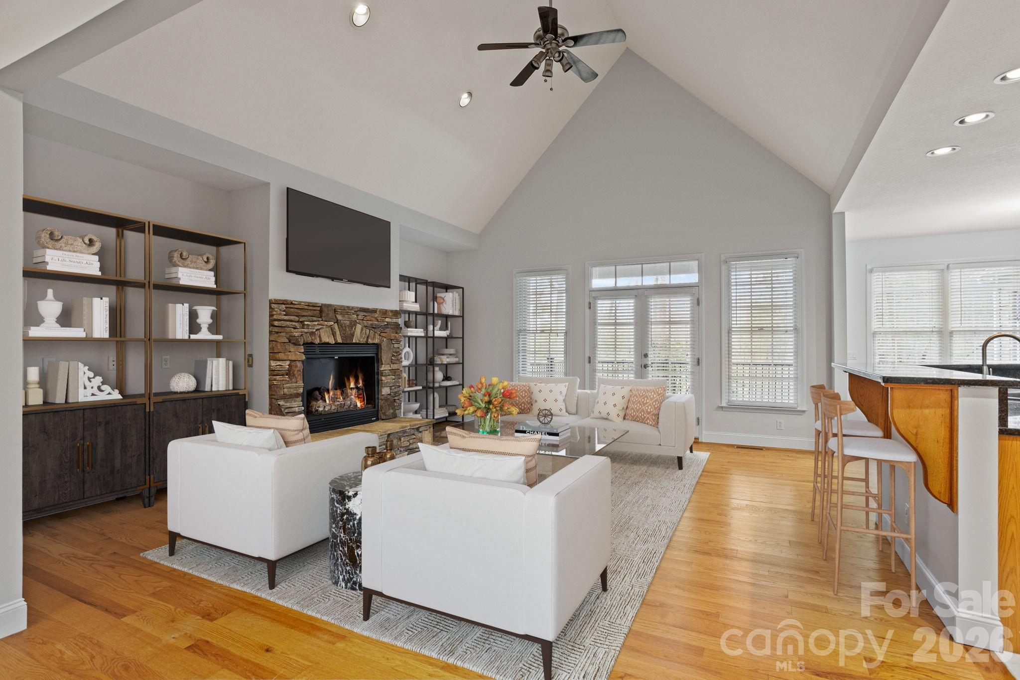 199 Judson Ridge Road Arden, NC 28704 - Photo 8 of 48 a living room with furniture fireplace and a large window