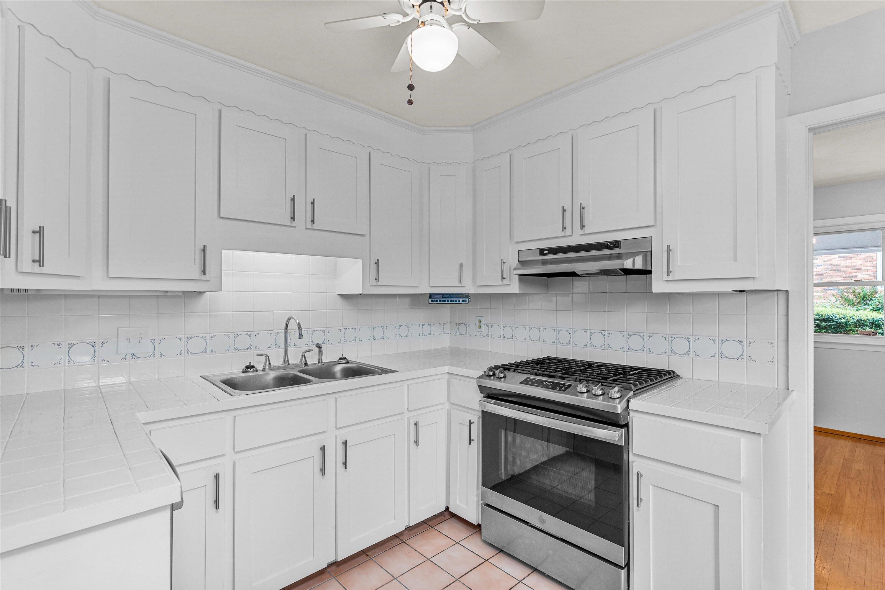 2236 Cadden Road Augusta, GA 30906 - Photo 9 of 26 Kitchen with stainless gas range and dishwasher