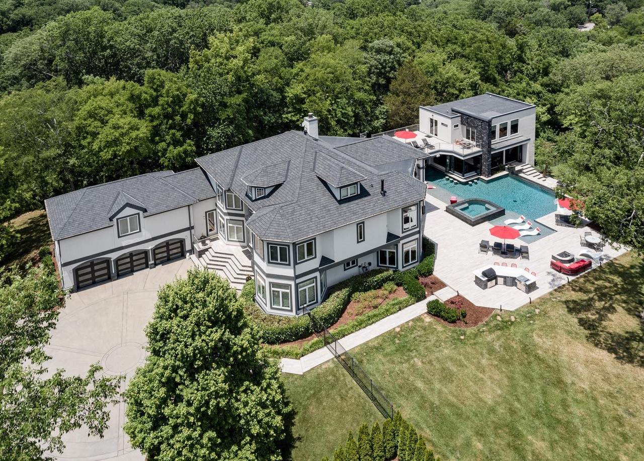 813 Deercrossing Nashville, TN 37220 - Photo 2 of 49 an aerial view of a house with a garden