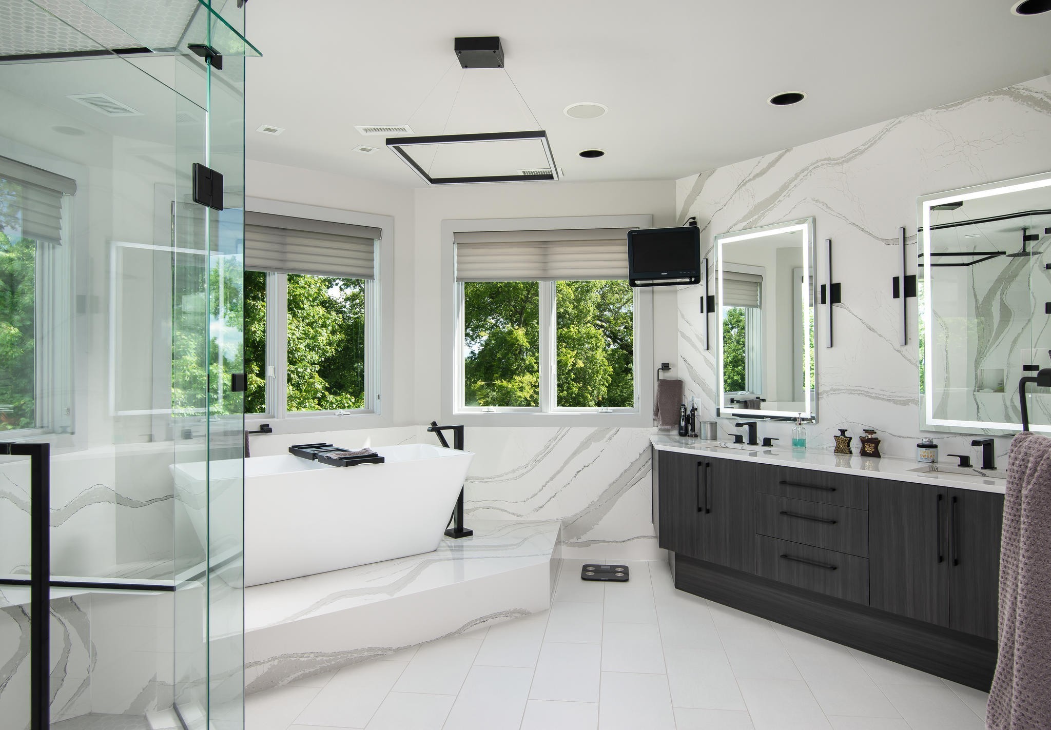 813 Deercrossing Nashville, TN 37220 - Photo 20 of 49 a large white tub sitting in a bathroom next to a window