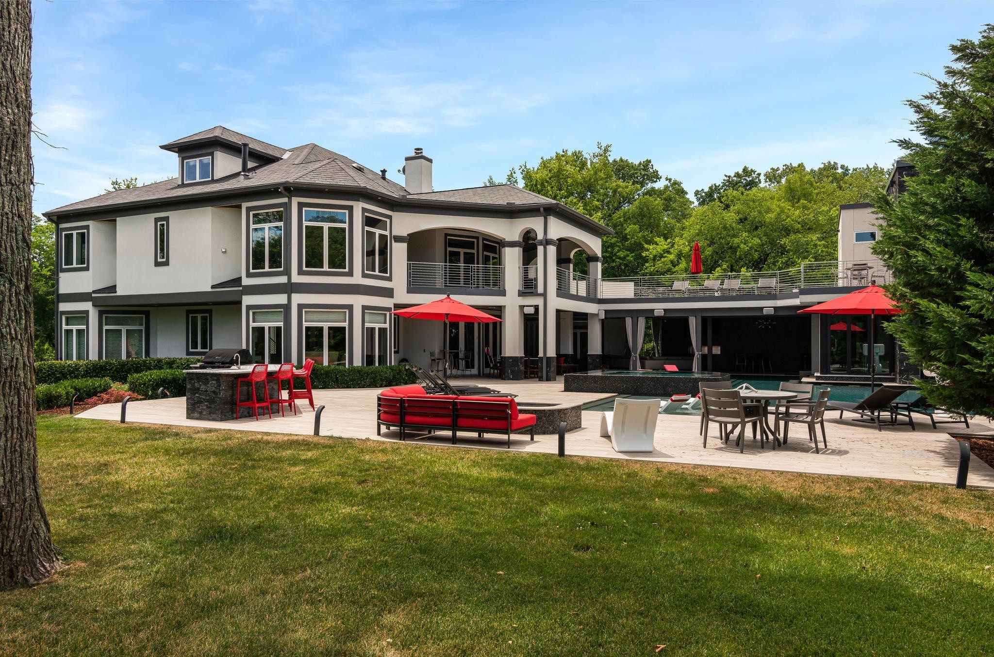 813 Deercrossing Nashville, TN 37220 - Photo 4 of 49 a group of people sitting in front of a house