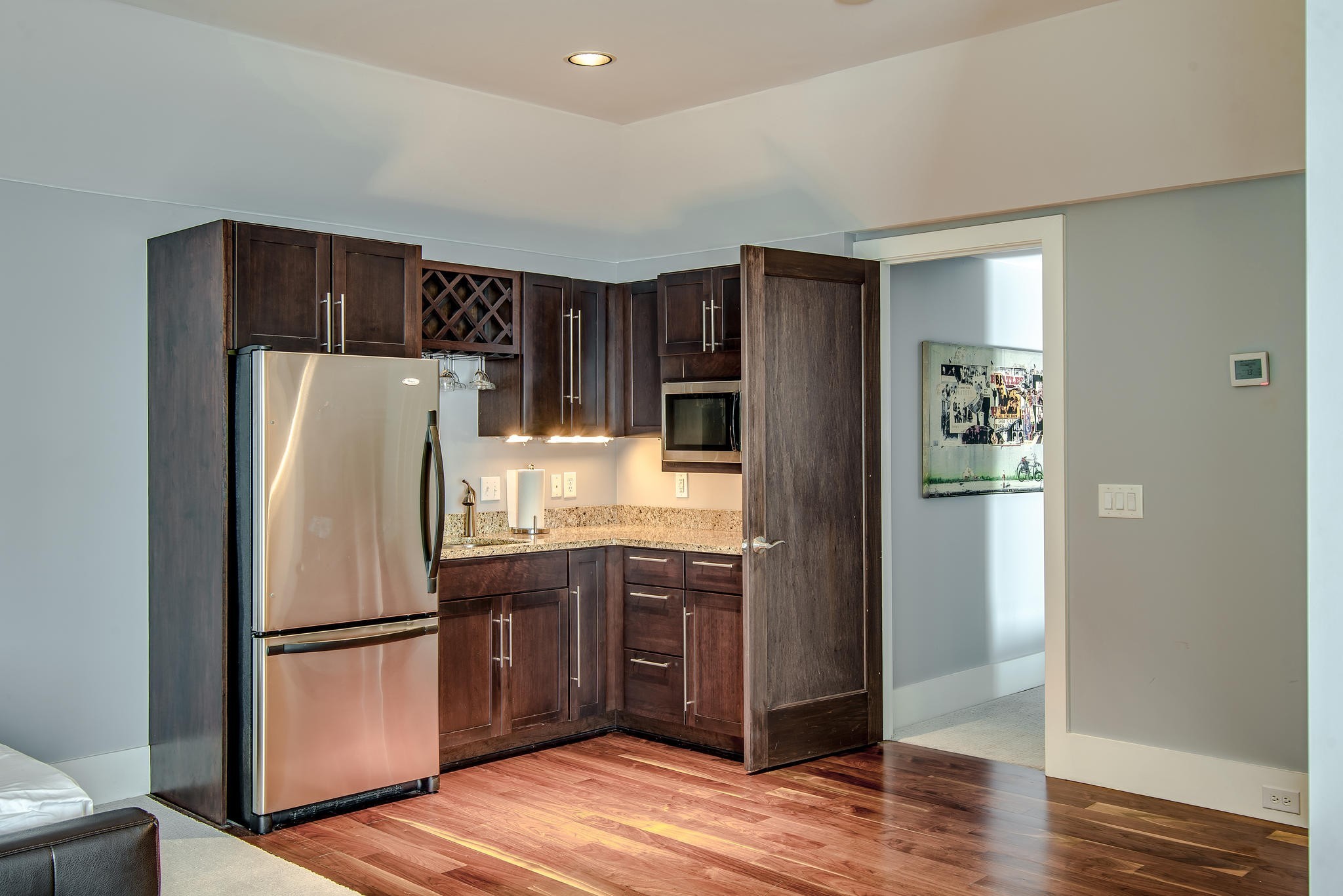 813 Deercrossing Nashville, TN 37220 - Photo 47 of 49 a kitchen with stainless steel appliances a refrigerator and wooden floor
