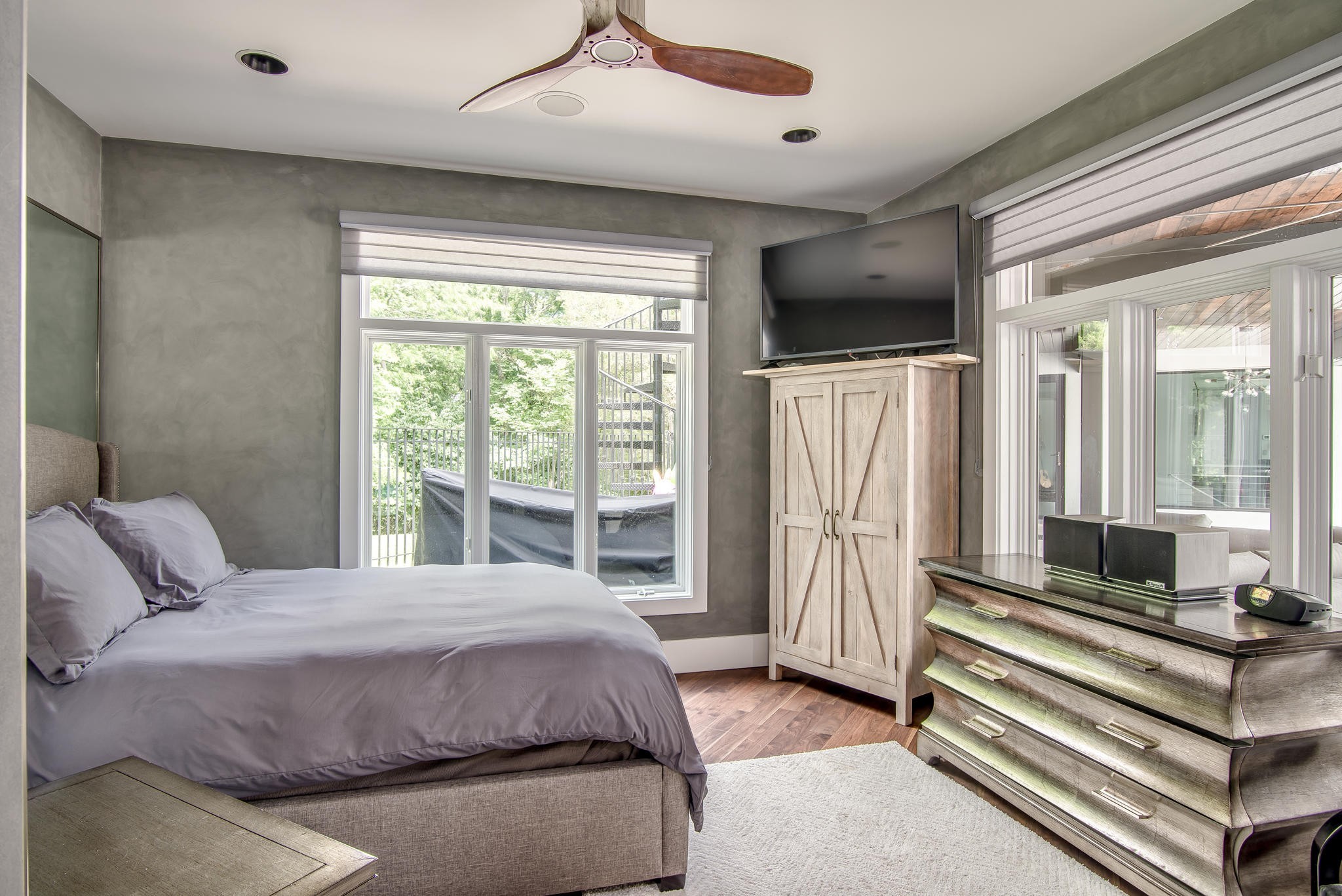 813 Deercrossing Nashville, TN 37220 - Photo 48 of 49 a bedroom with a large bed and a chandelier