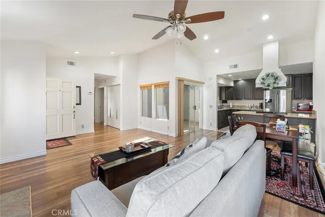 a living room with furniture and a table