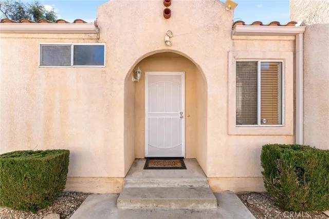 a view of a backyard of a house
