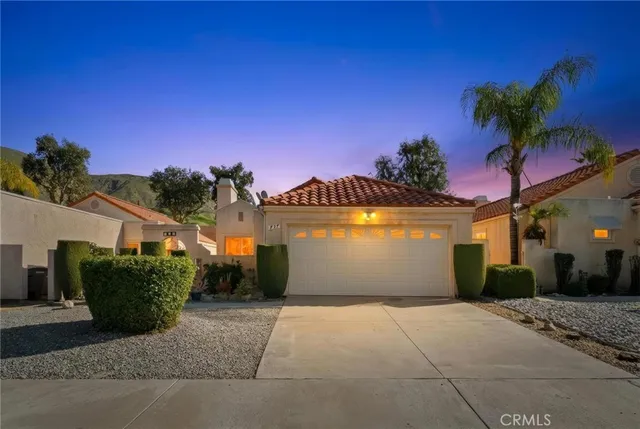 a view of a house with a street