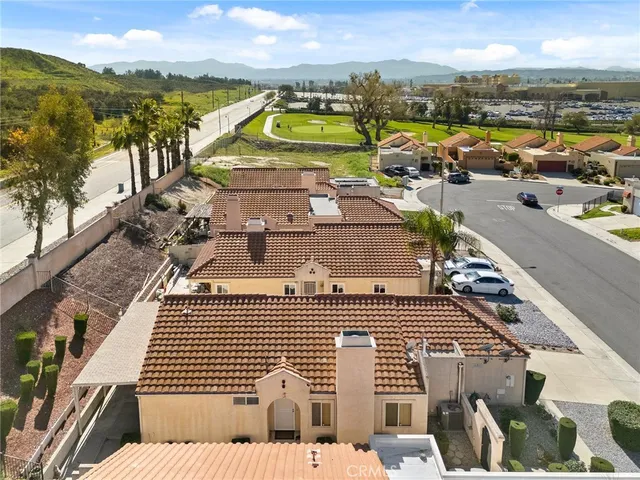 a view of a building with a yard