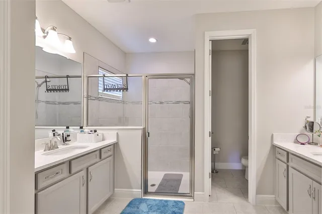 a bedroom with a bed and a table in it