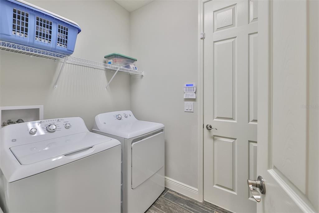 7411 Windport Lane Apollo Beach, FL 33572 - Photo 36 of 71 a utility room with dryer and washer