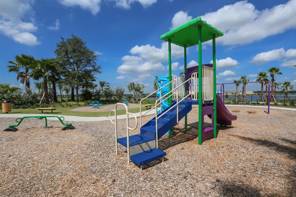 7411 Windport Lane Apollo Beach, FL 33572 - Photo 60 of 71 a view of a park with slide