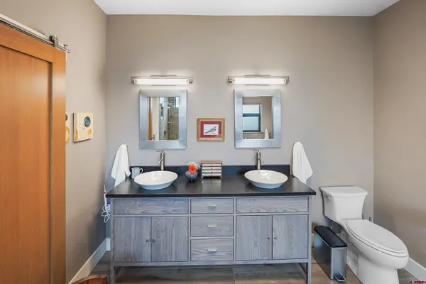 a kitchen with a stove and cabinets