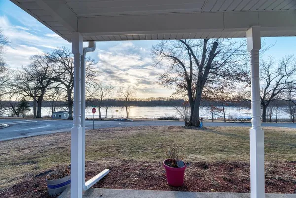 a view of a porch with a yard