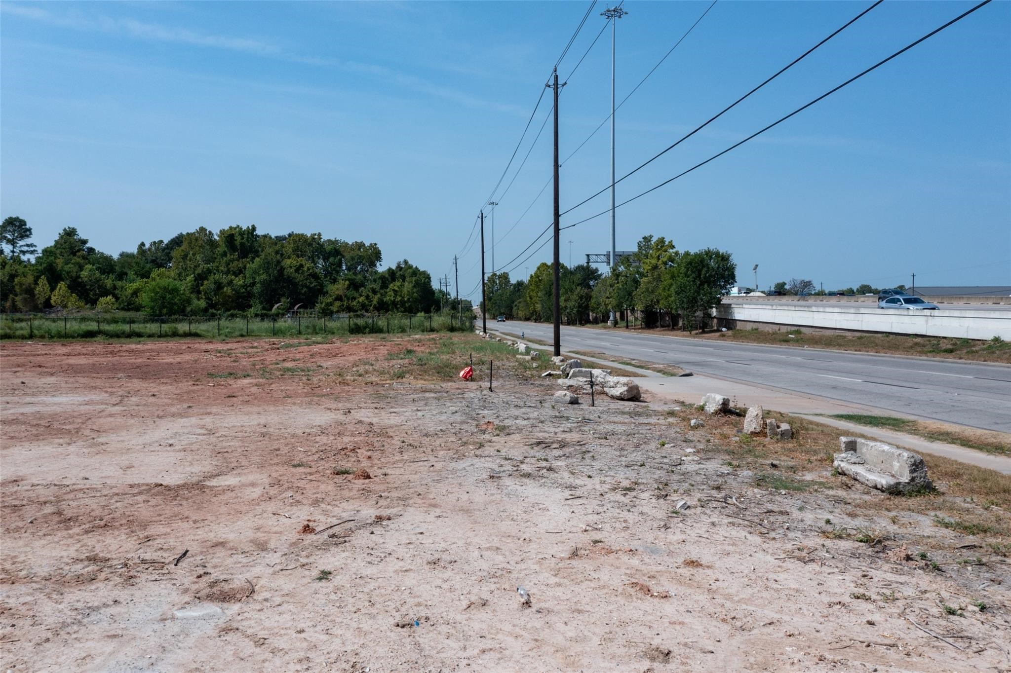 11324 Eastex Rd Freeway Houston, TX 77093 - Photo 19 of 19 a view of a dry yard with trees