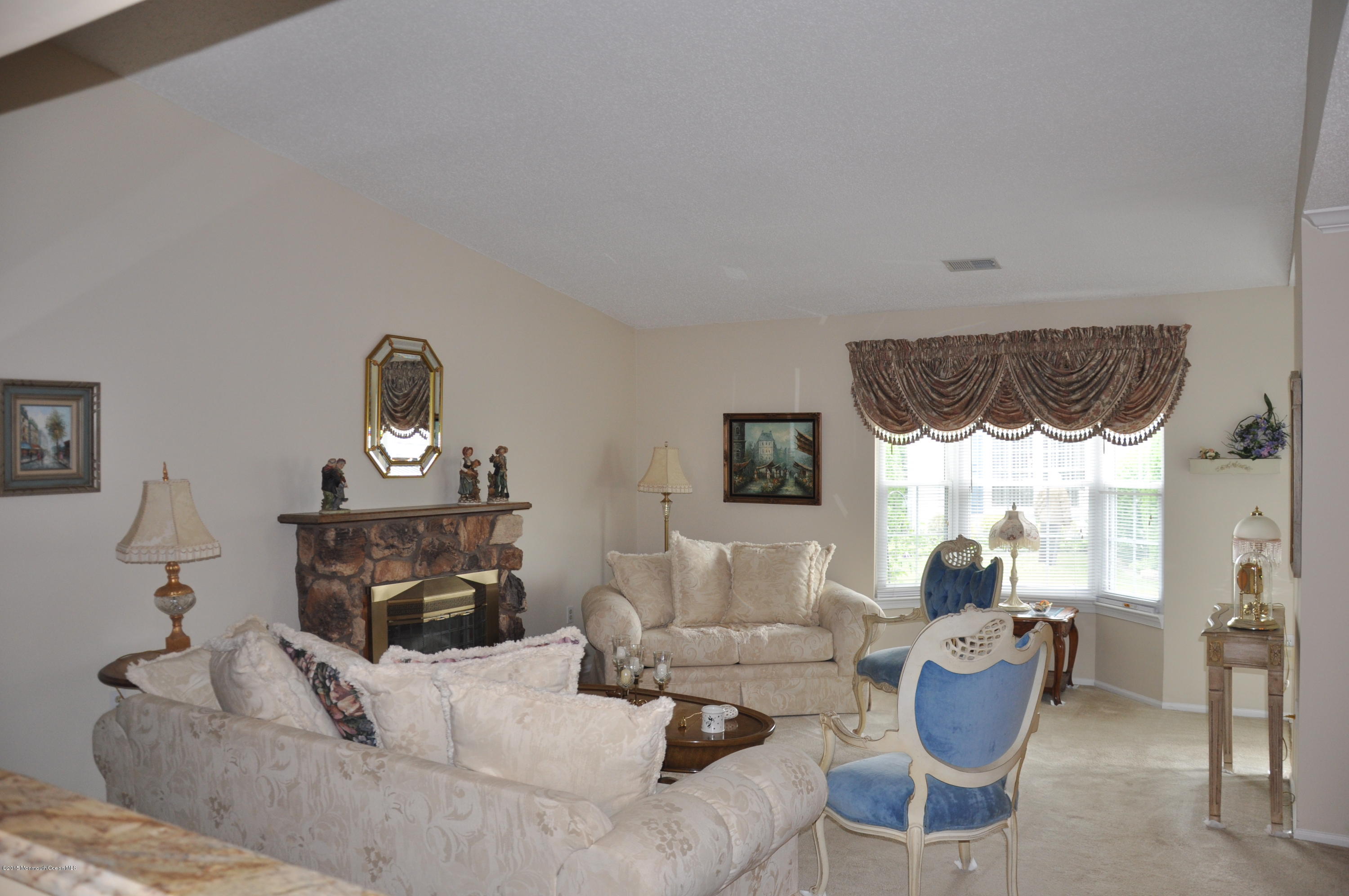 6 Ivy Ridge Close, Unit 1000 Freehold, NJ 07728 - Photo 14 of 18 another pic living room