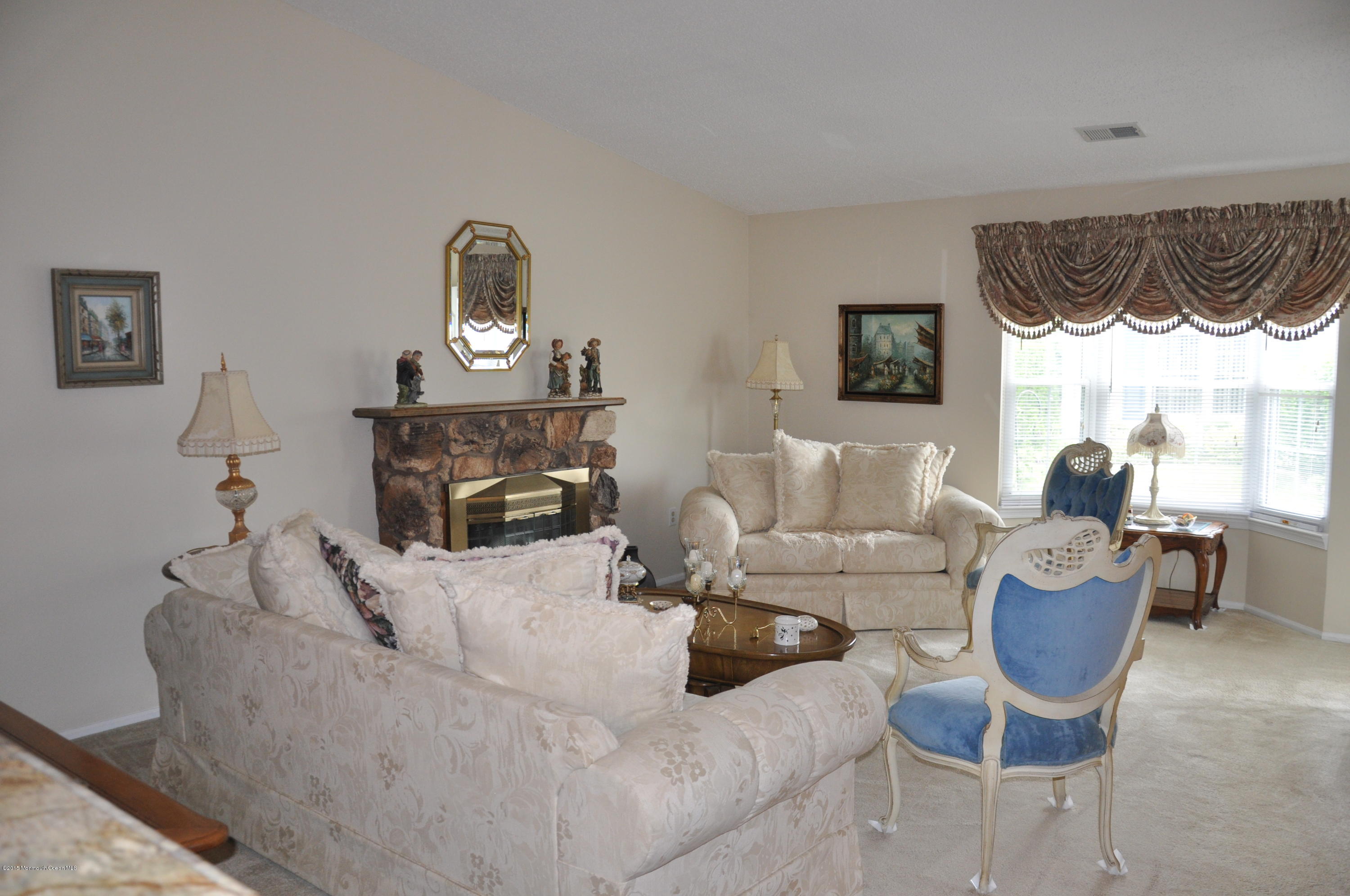 6 Ivy Ridge Close, Unit 1000 Freehold, NJ 07728 - Photo 18 of 18 living room