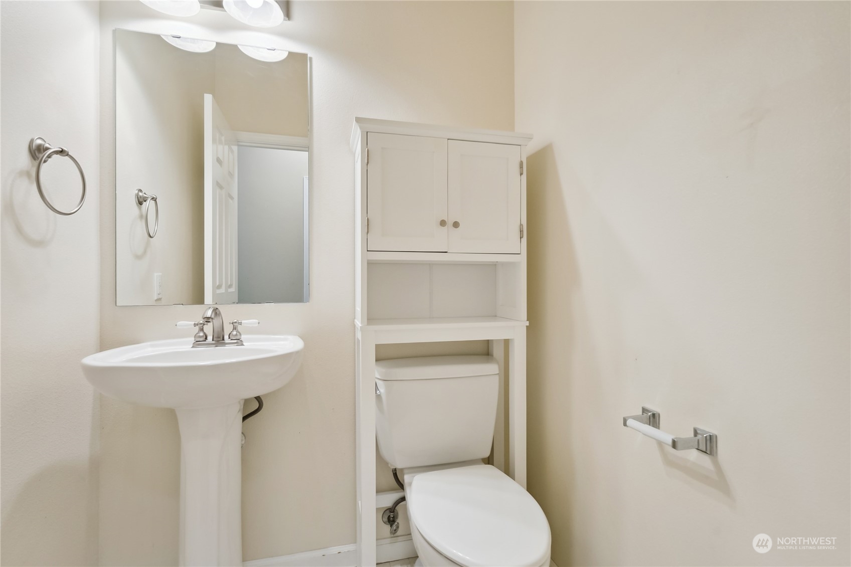 9639 39th Loop Northeast Olympia, WA 98516 - Photo 21 of 38 a bathroom with a sink a toilet and mirror
