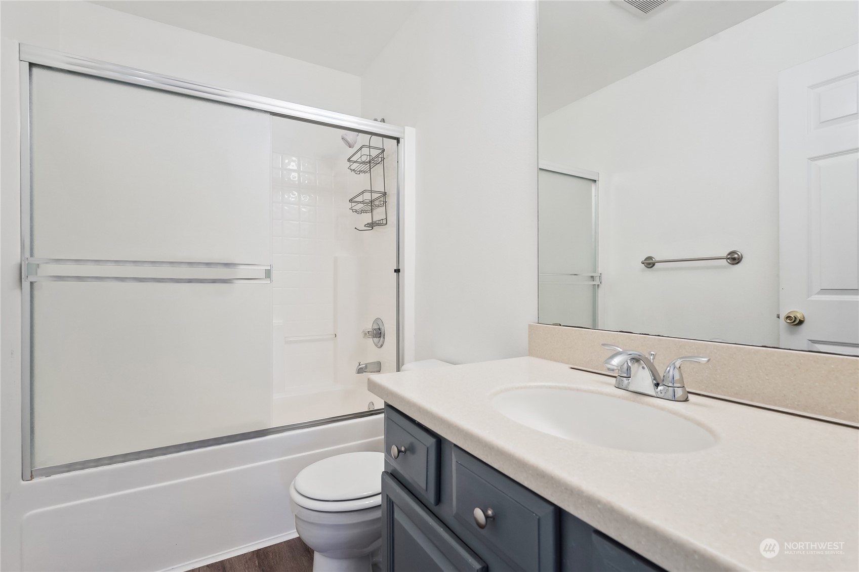 9639 39th Loop Northeast Olympia, WA 98516 - Photo 24 of 38 a bathroom with a granite countertop sink toilet and shower