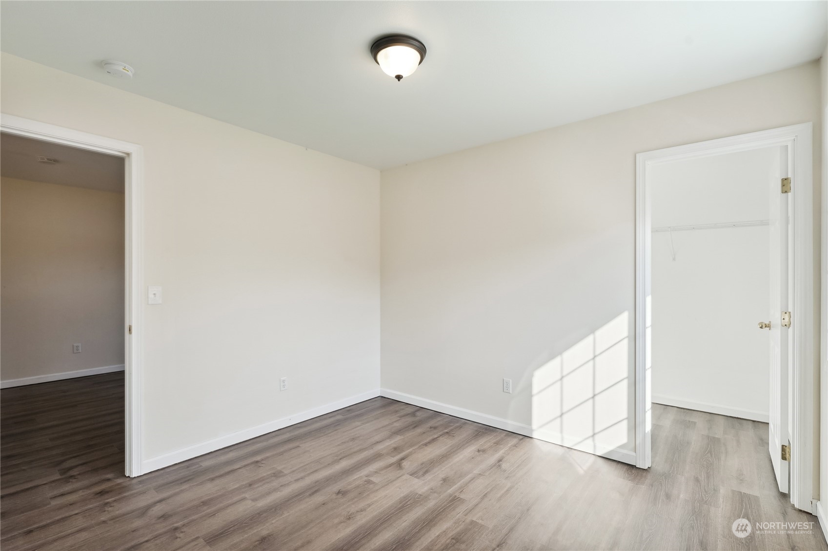 9639 39th Loop Northeast Olympia, WA 98516 - Photo 26 of 38 an empty room with wooden floor