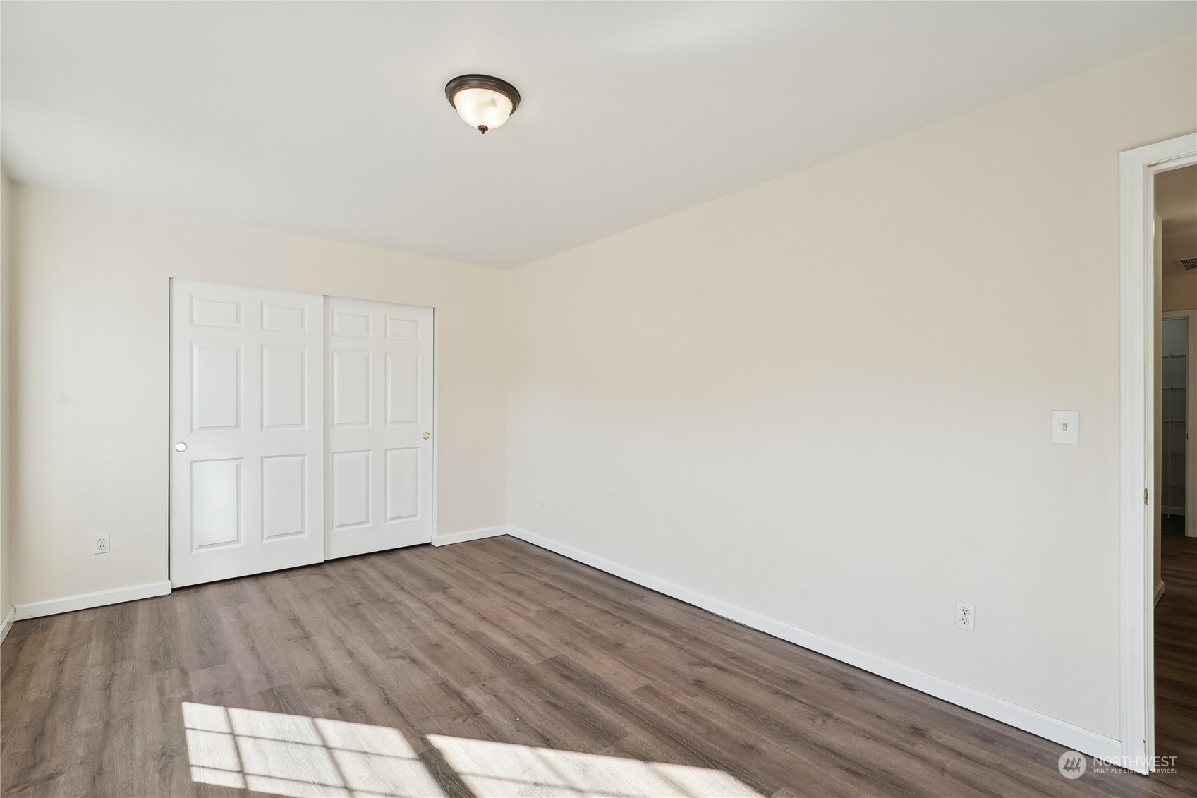9639 39th Loop Northeast Olympia, WA 98516 - Photo 30 of 38 a view of empty room with wooden floor