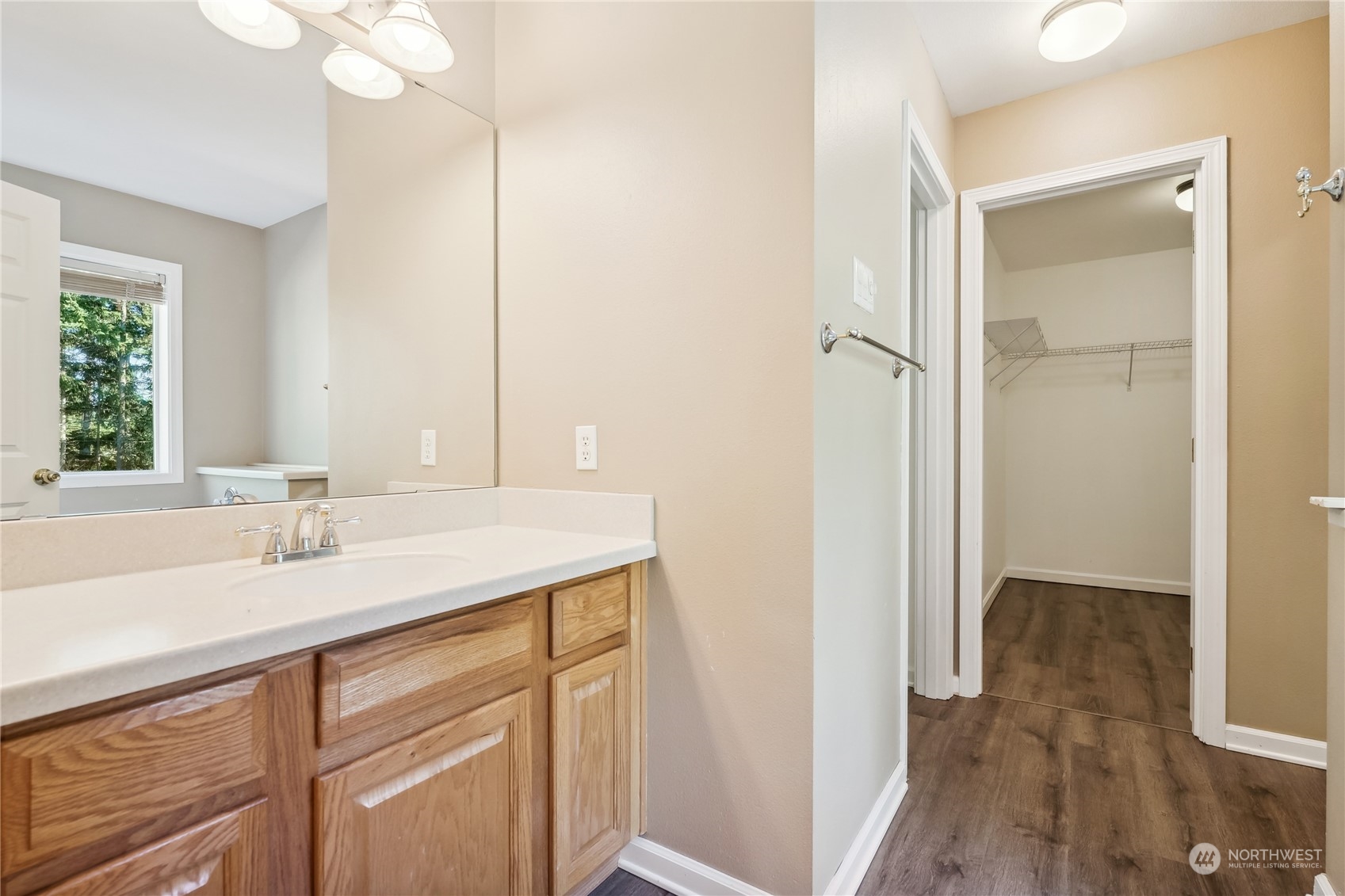 9639 39th Loop Northeast Olympia, WA 98516 - Photo 34 of 38 a bathroom with a sink and a mirror