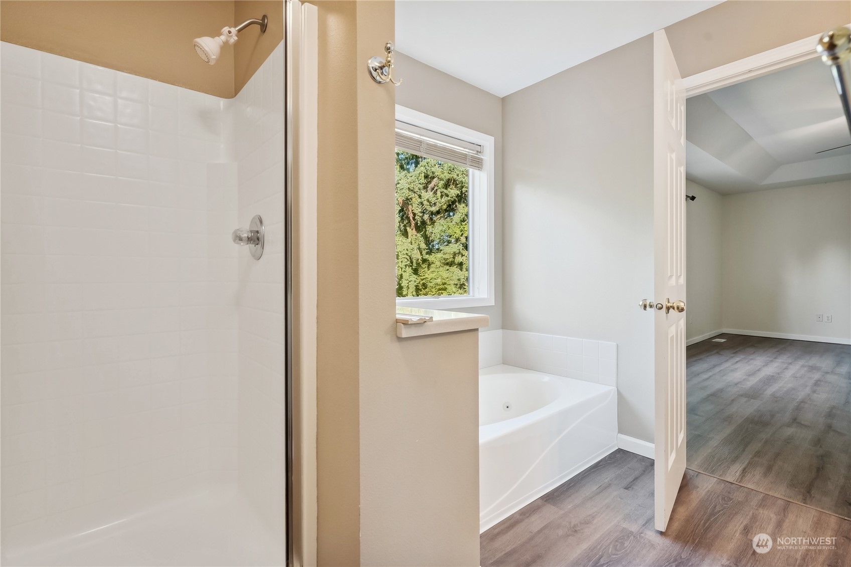 9639 39th Loop Northeast Olympia, WA 98516 - Photo 35 of 38 a bathroom with a bathtub and a window
