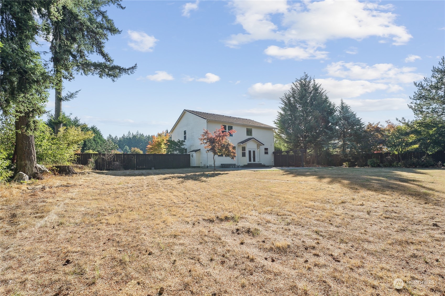 9639 39th Loop Northeast Olympia, WA 98516 - Photo 8 of 38 a view of a backyard of the house