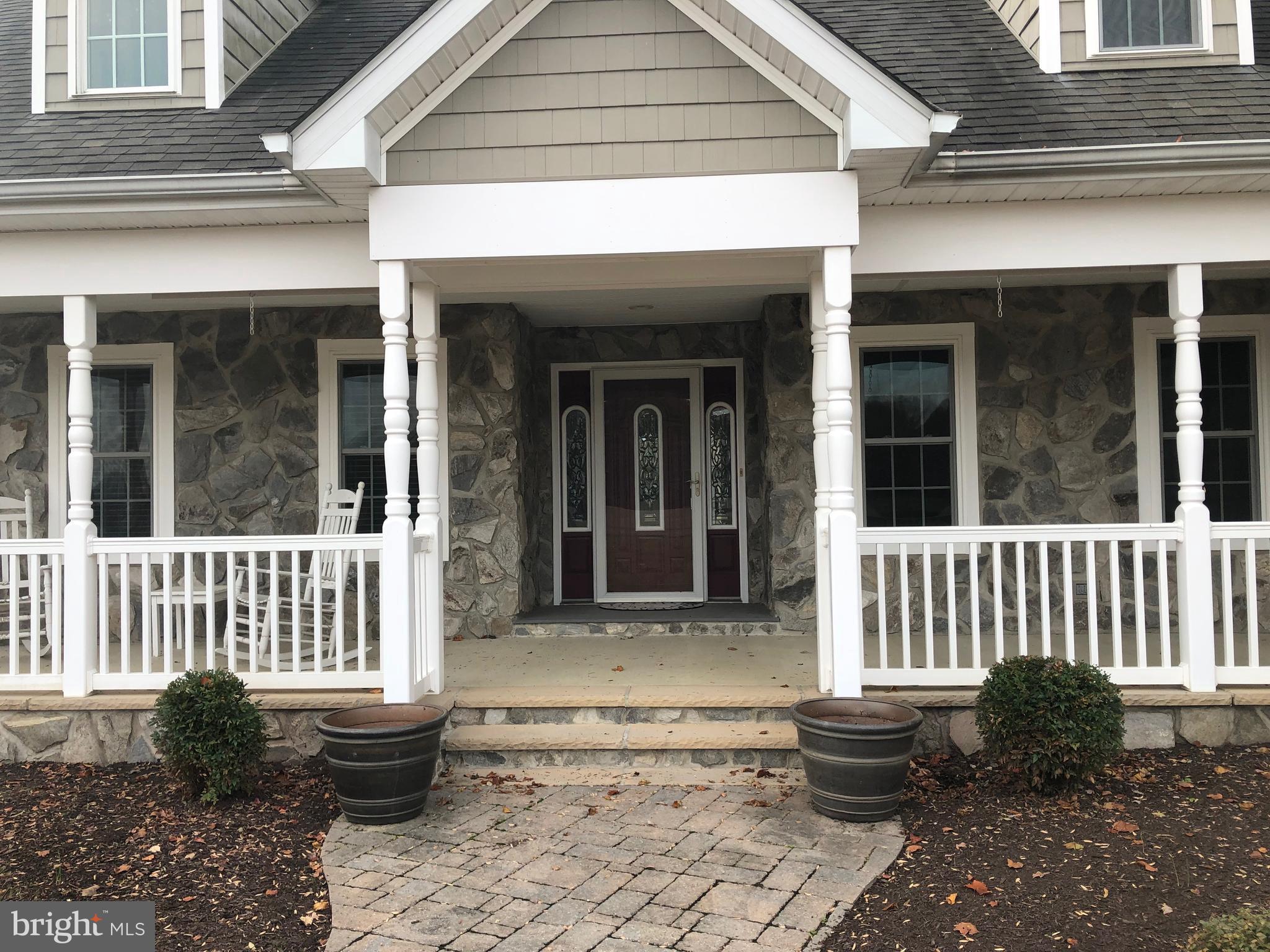 13978 Clarks Lane Ridgely, MD 21660 - Photo 2 of 28 Beautiful stone front with brick pavers