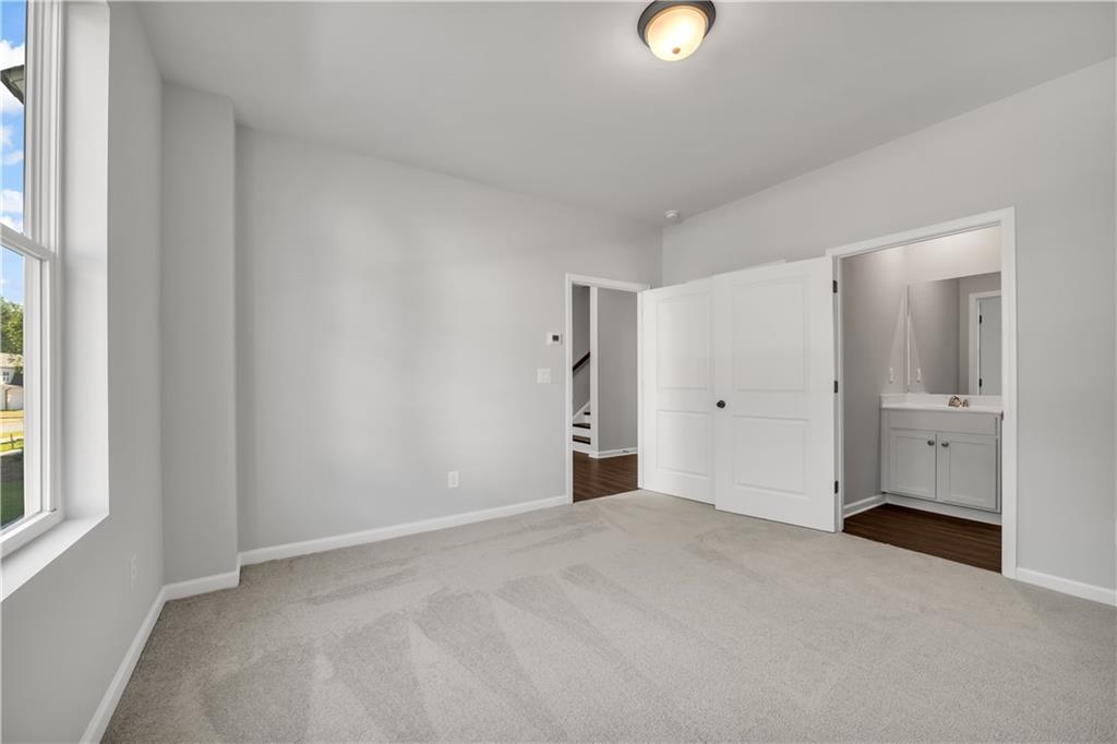 668 Devon Alley Acworth, GA 30102 - Photo 11 of 38 a view of an empty room