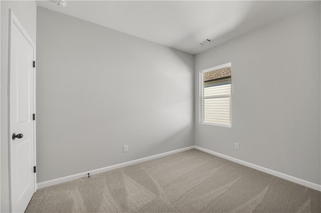 668 Devon Alley Acworth, GA 30102 - Photo 33 of 38 an empty room with a window