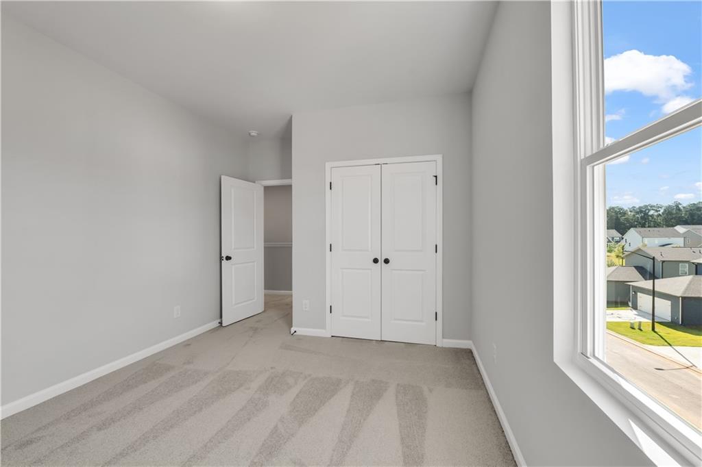 668 Devon Alley Acworth, GA 30102 - Photo 36 of 38 a view of an empty room with a window