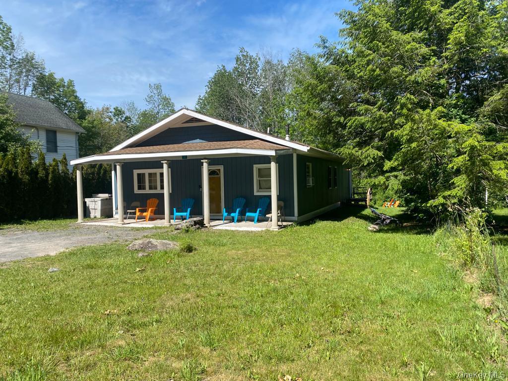 111 Spring Street Tannersville, NY 12485 - Photo 1 of 9 front view of a house with a yard