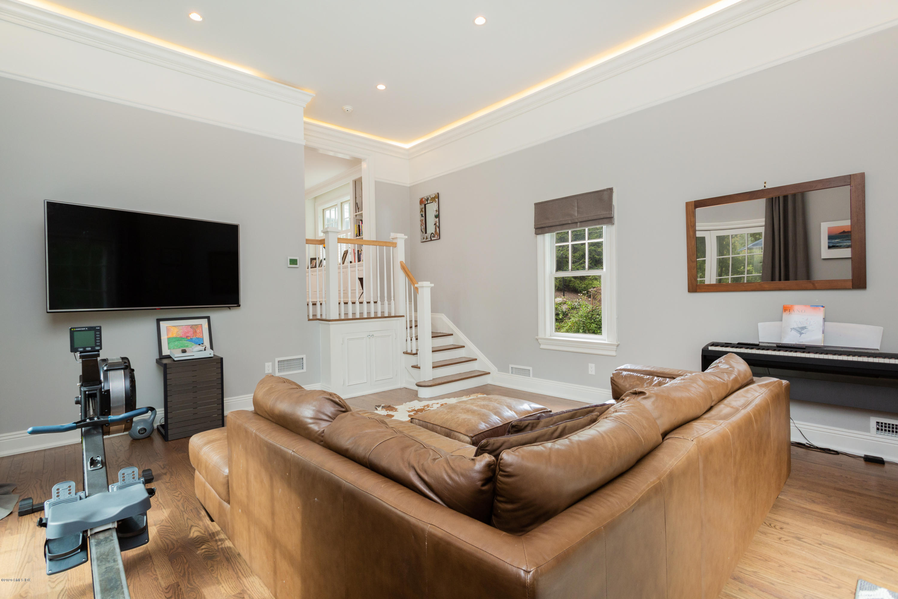 36 Evergreen Road Greenwich, CT 06830 - Photo 17 of 40 a living room with furniture and a flat screen tv