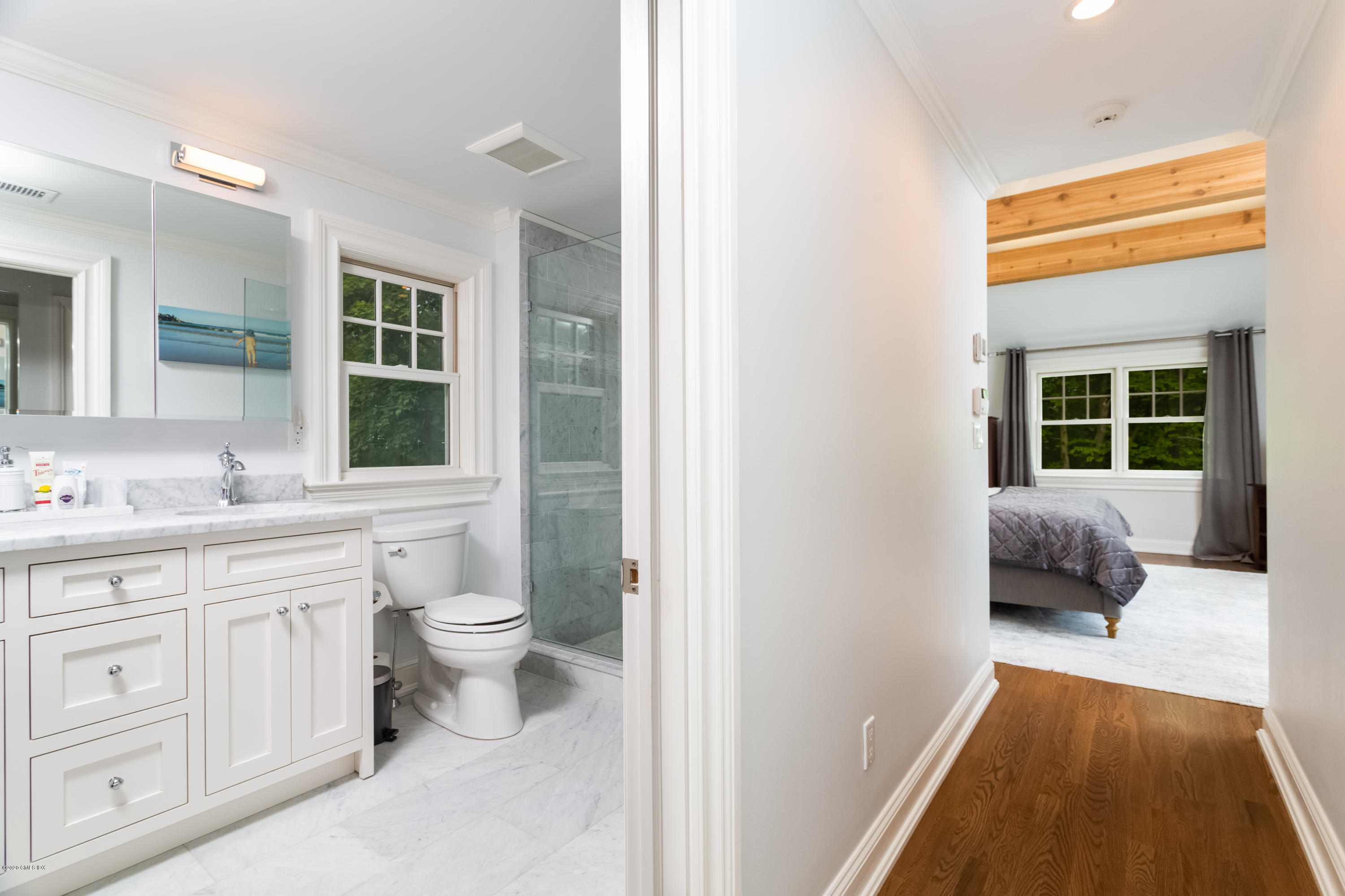 36 Evergreen Road Greenwich, CT 06830 - Photo 24 of 40 a en suite bathroom with a toilet sink and mirror