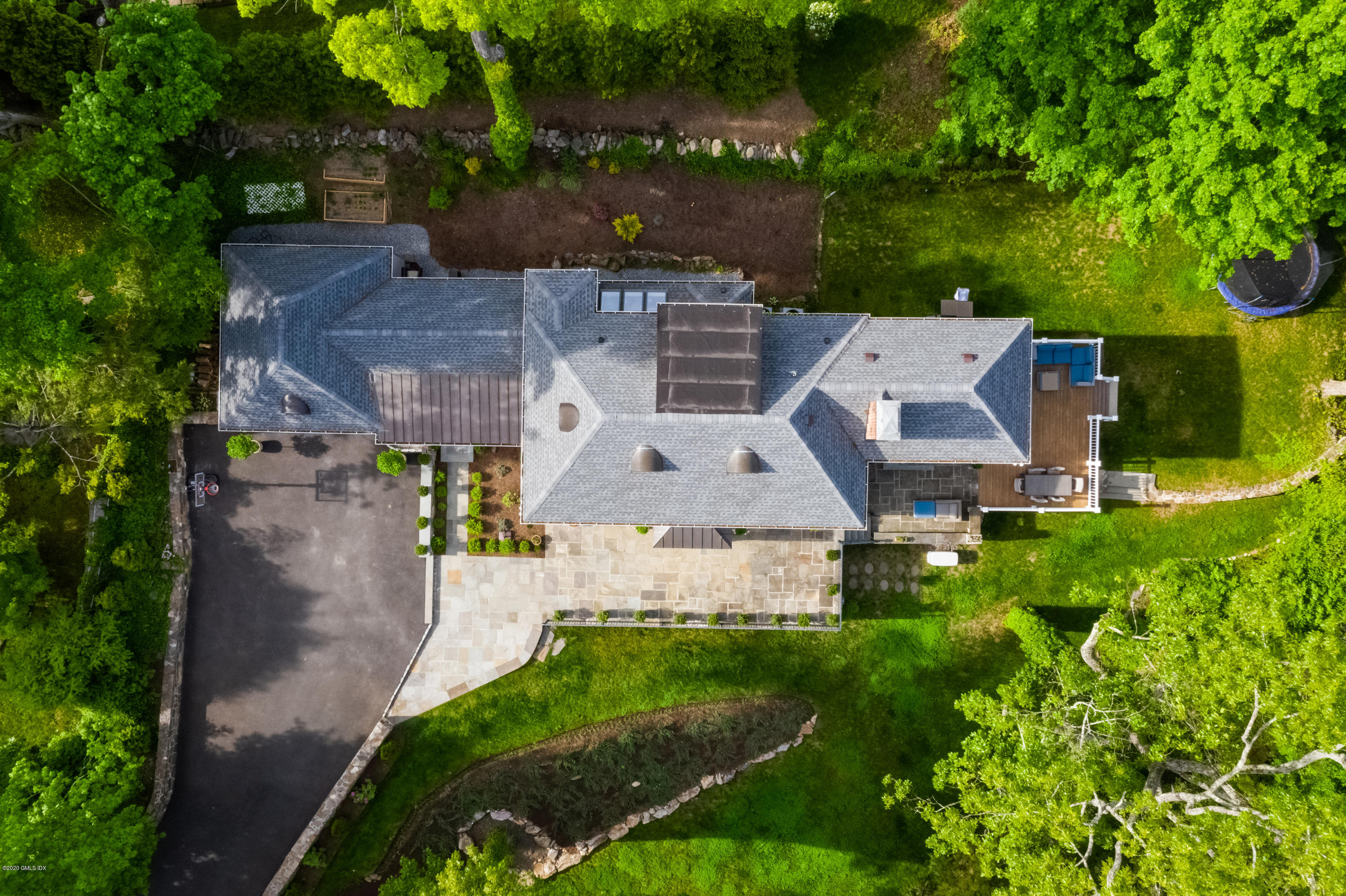 36 Evergreen Road Greenwich, CT 06830 - Photo 36 of 40 an aerial view of a house with a garden