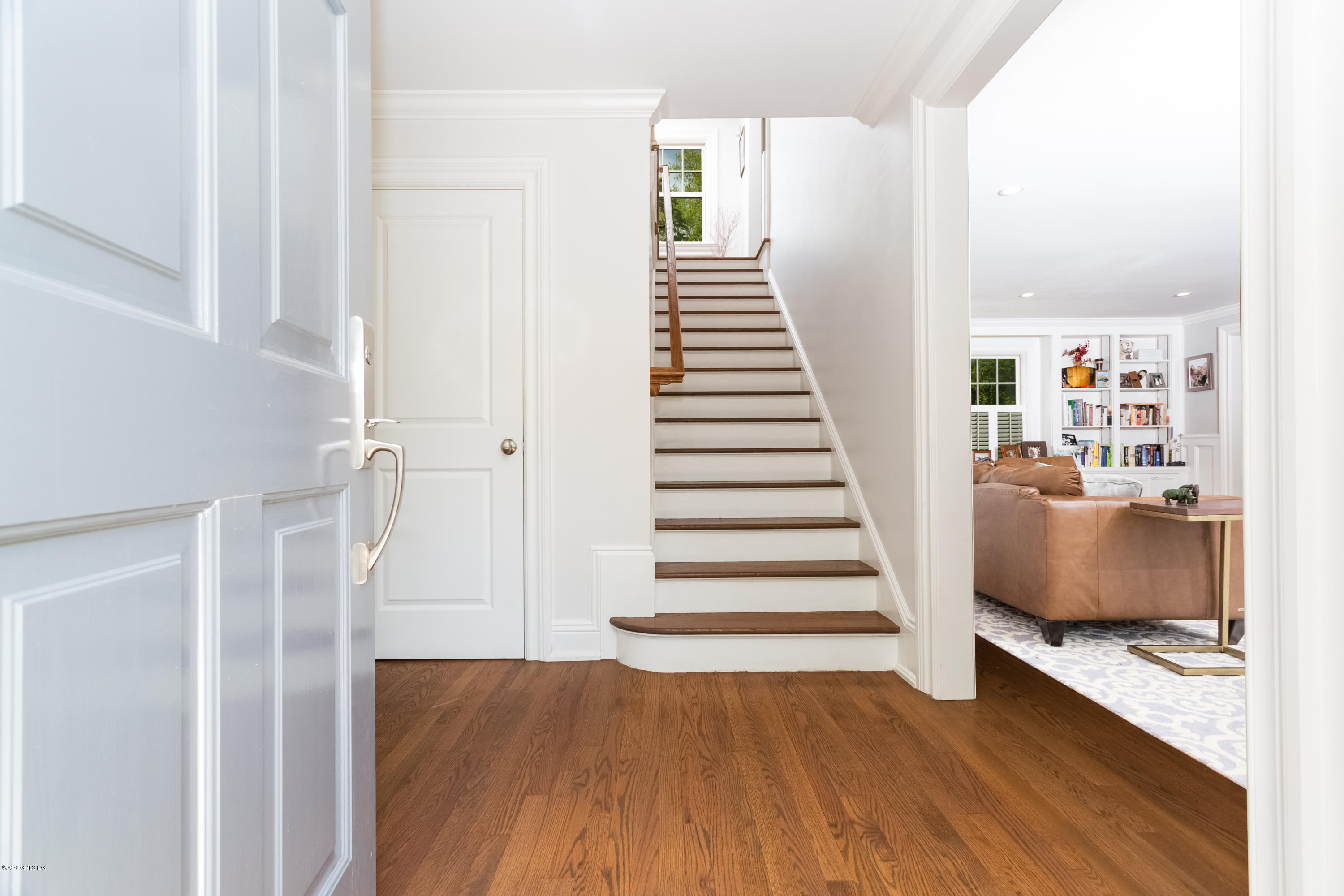 36 Evergreen Road Greenwich, CT 06830 - Photo 5 of 40 a view of a room with wooden floor and stairs