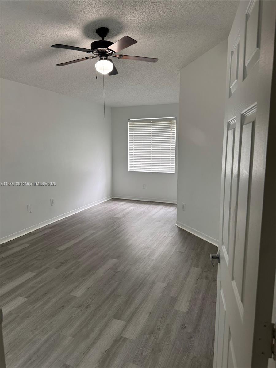 Pembroke Pines Pembroke Pines, FL 33024 - Photo 12 of 15 a view of an empty room with a window