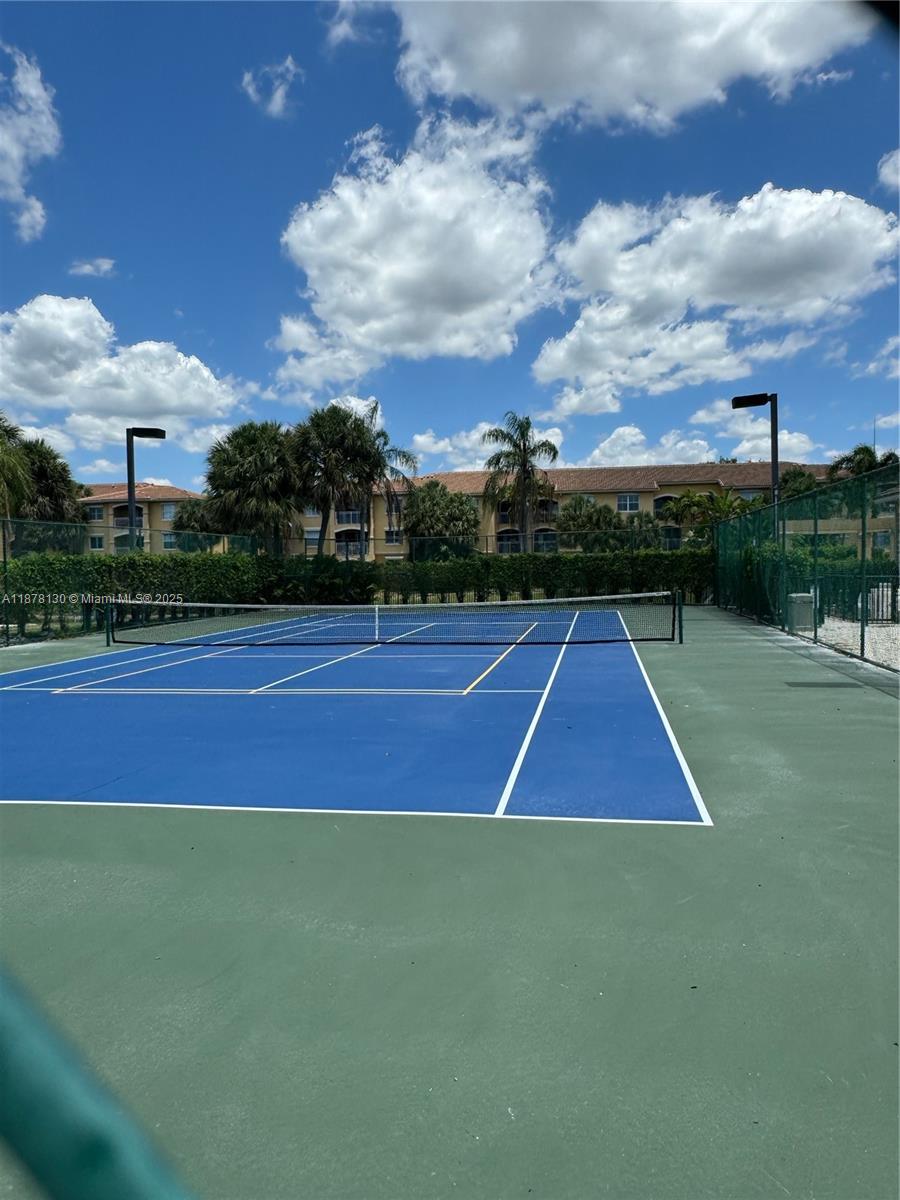Pembroke Pines Pembroke Pines, FL 33024 - Photo 4 of 15 a tennis court that has tennis net