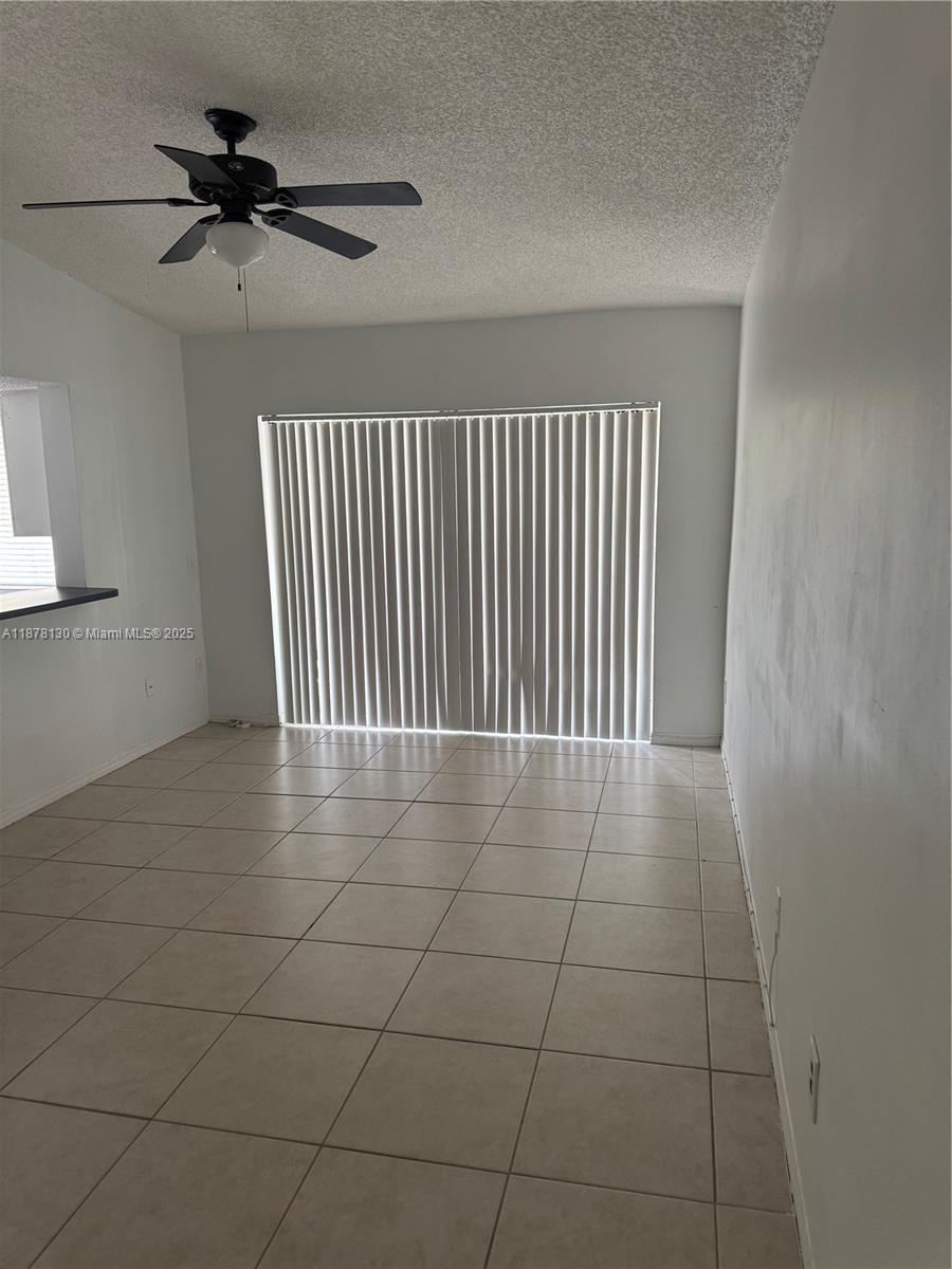 Pembroke Pines Pembroke Pines, FL 33024 - Photo 9 of 15 a view of an empty room with a window